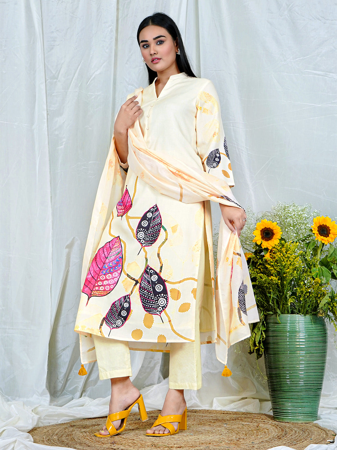 Cream Kurta Set with Vibrant Leaf Motifs & Golden Tassels
