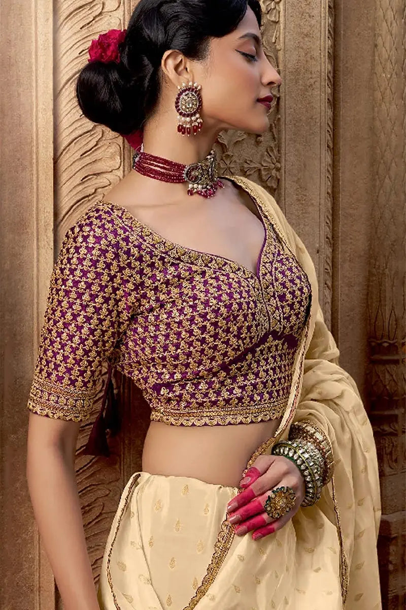 Cream Handwoven Banarasi Saree with Red Embroidered Blouse