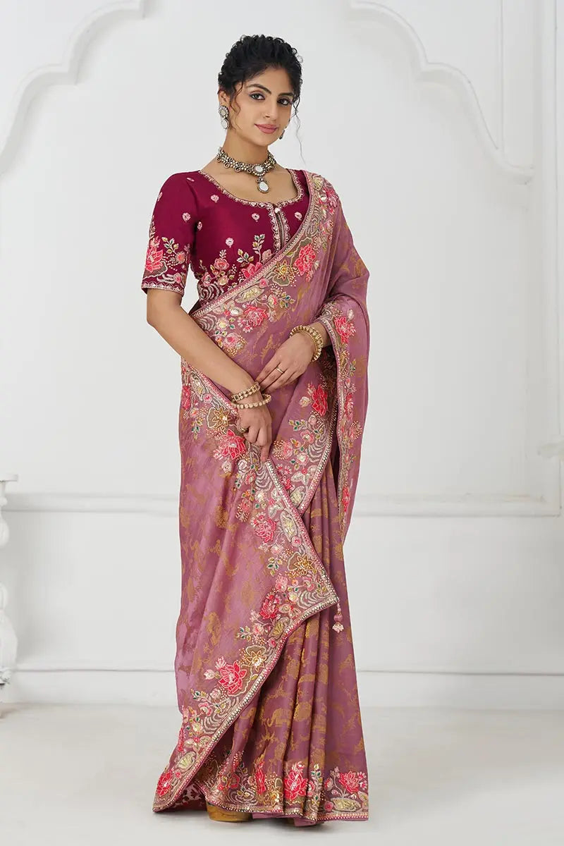Threaded Blossoms: Pink Saree with Colorful Floral Embroidery
