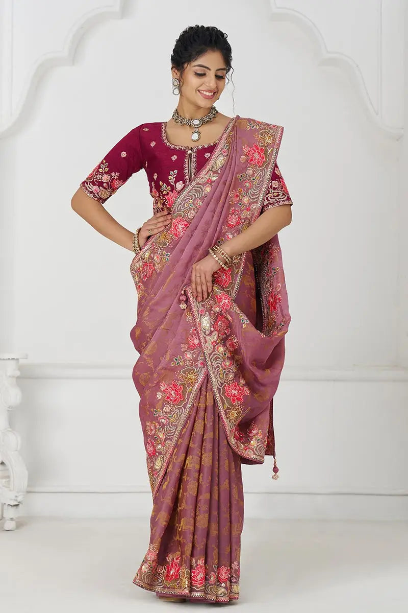Threaded Blossoms: Pink Saree with Colorful Floral Embroidery